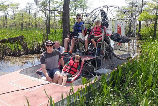Group Of people taking an Airboat Ride in Southeast Texas