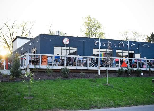 A shot of people dining on the patio at Cardinal Spirits