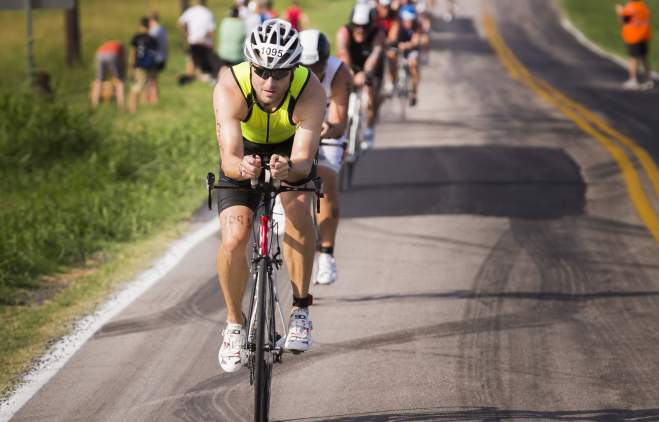 Man on bike in line of cyclists