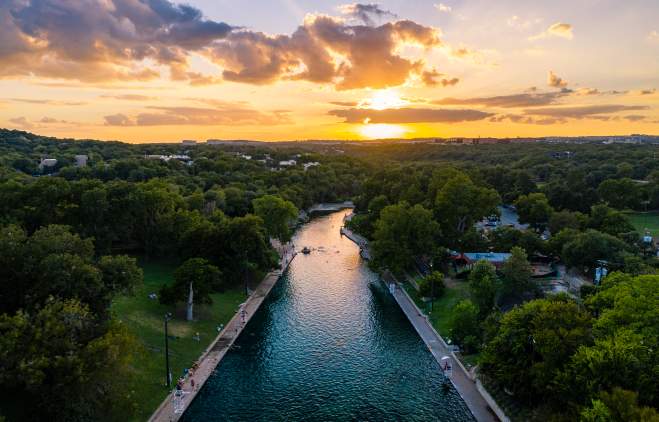 Aerial view of Barton Springs Pool at Sunset in Austin Texas
