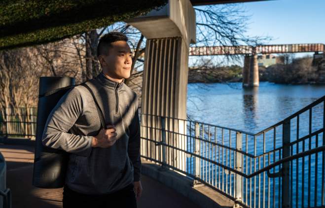 Man walks to Swift Fit Events class near Lady Bird Lake