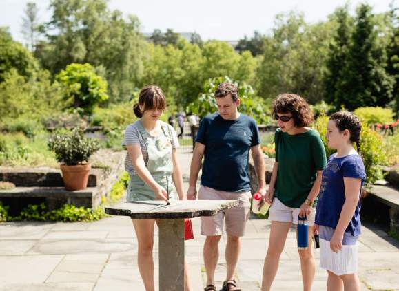 family at botanic garden sun dial