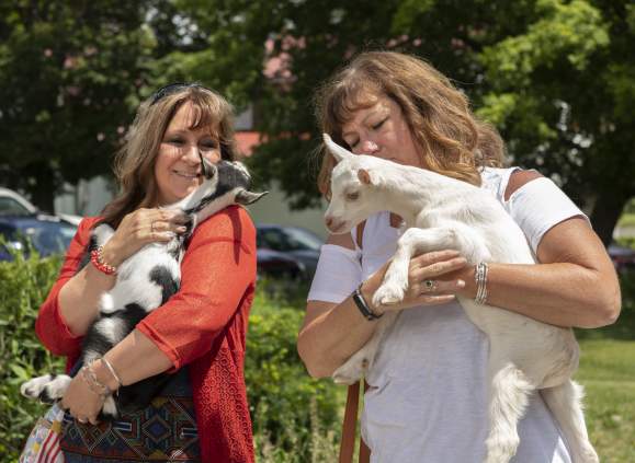 Women with Goats