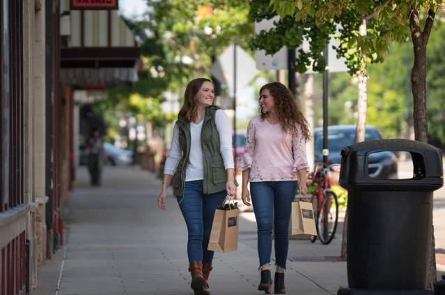 Two ladies shopping downtown