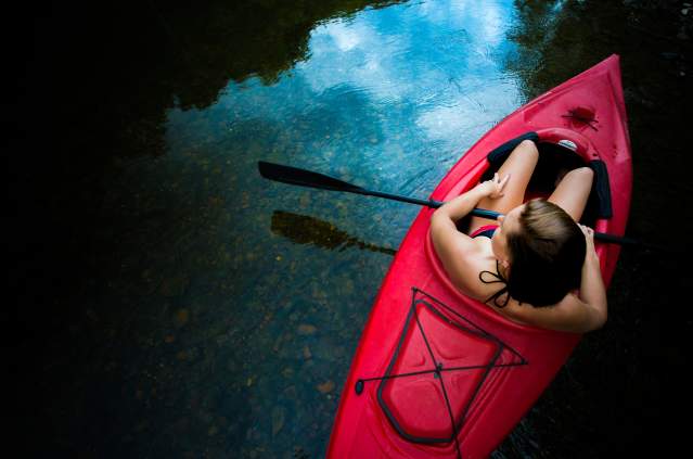 overhead girl sitting in kayak on Shenandoah River