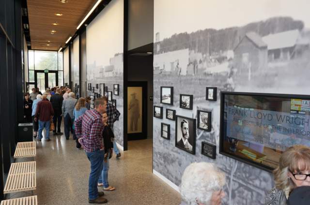 People Enjoying The Exhibits At The Chandler Museum