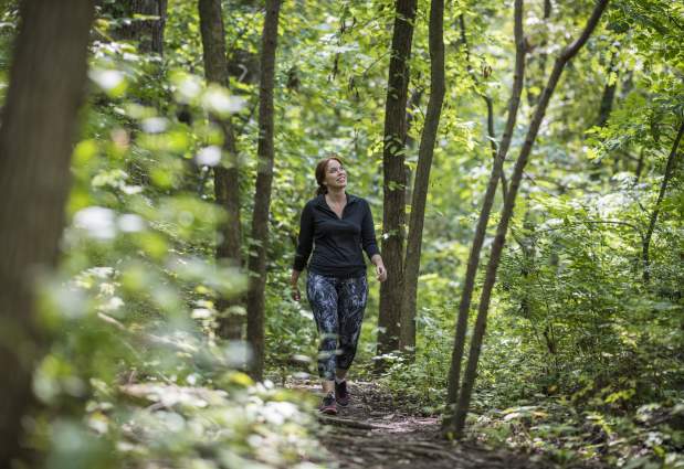 woman forest trail