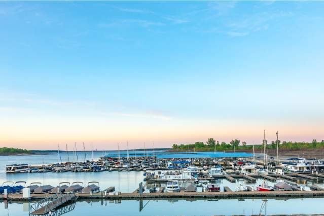 Overlook of Saylorville Lake and boats docked at the harbor