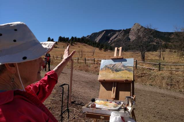 Painter in Front of Flatirons Boulder