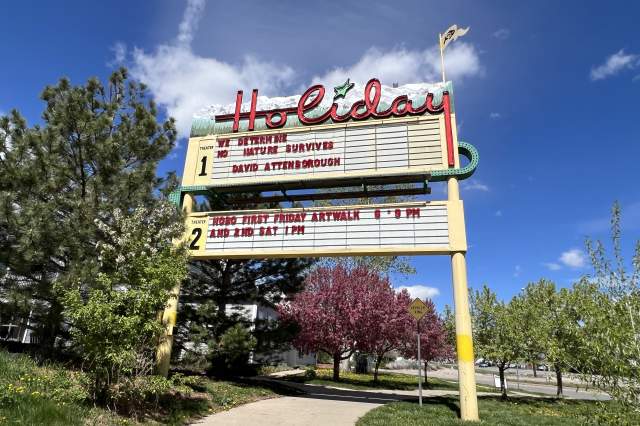 The Holiday Theater Sign