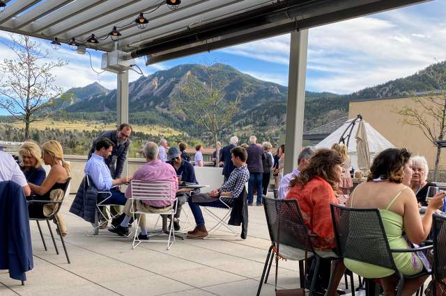 The Rooftop at Corrida with a view of the Flatirons in the background