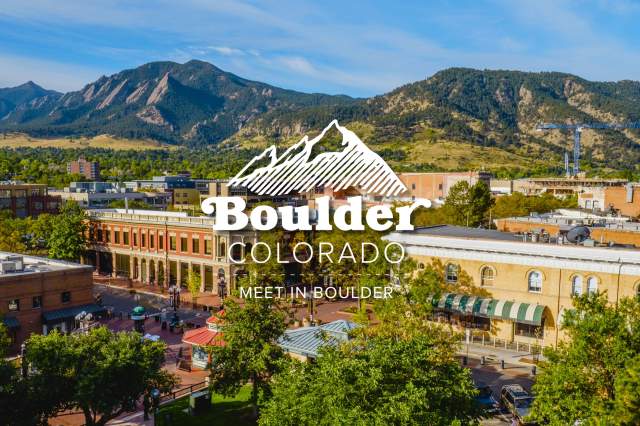 Downtown aerial photograph of Boulder, Colorado with the Meet in Boulder logo