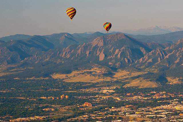 Hot Air Balloons over the Flatirons in Boulder