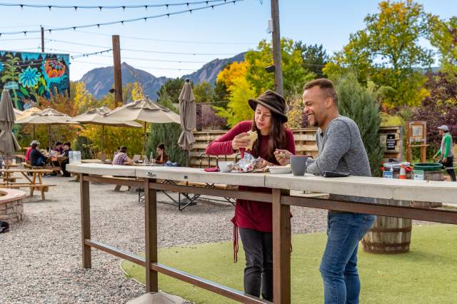 Couple Eating Outside During Fall In Boulder, CO