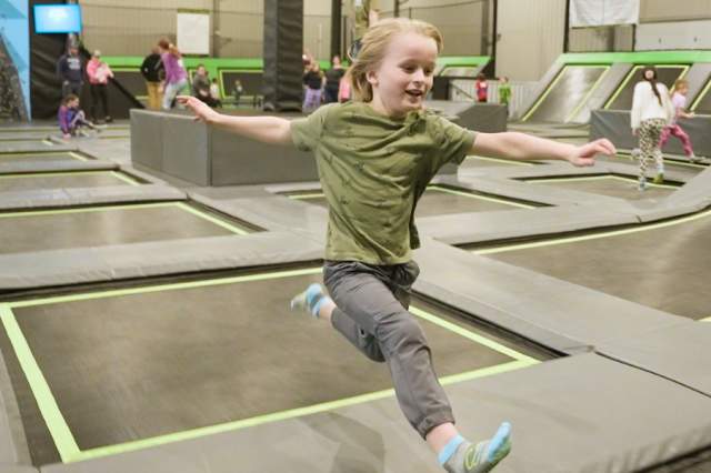 Boy jumps at Sawmill Trampoline Park