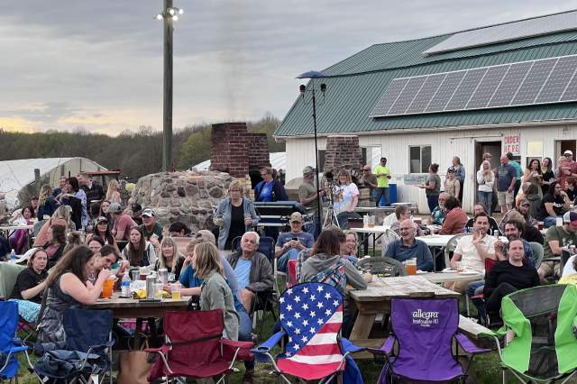 The crowd at Stoney Acres Pizza farm enjoys the day.