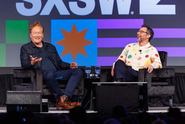 Image of Conan O' Brien and Nick Kroll sitting on stage at SXSW 2024.