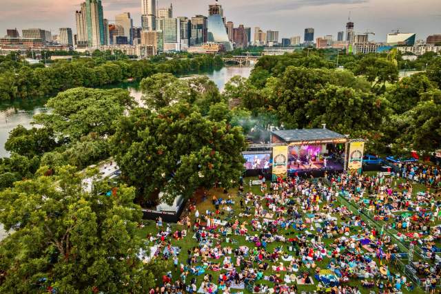 Aerial photo of Blues on the Green with downtown skyline in the background.