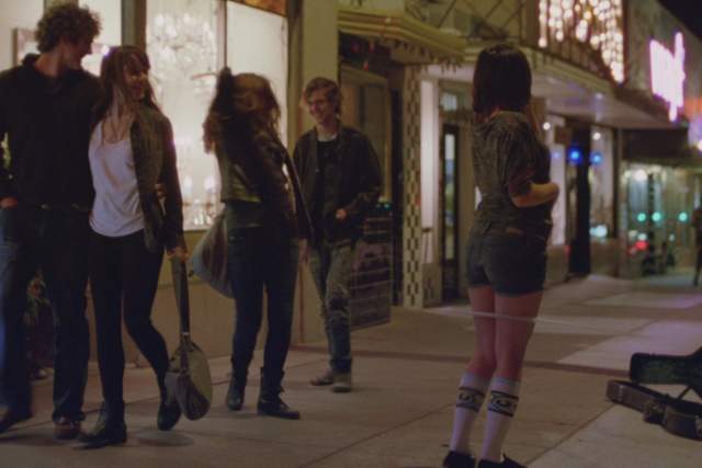 Boyhood screengrab, Mason and Sheena walking down South Congress