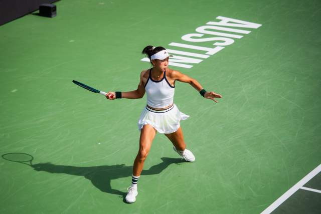 Yuan Yue hitting the ball at the ATX Open 2024.