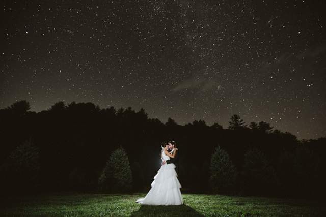Bride and Groom at night with trees in the background