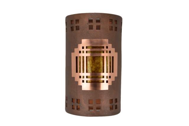 a copper light cover with window shaped designs sits on a white background