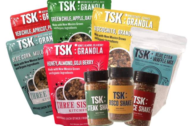 Assortment of Three Sisters Kitchen food products, including various flavors of granola packs and spice shakes.