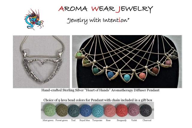 Promotional image for Aroma Wear Jewelry featuring a handcrafted sterling silver "Heart of Hands" aromatherapy diffuser pendant displayed on a black background. Below the pendant, a variety of lava bead colors are shown including mint, forest green, aqua, teal blue, turquoise, neon, burgundy, velvet, and charcoal. Each bead is intended for use with the pendant.
