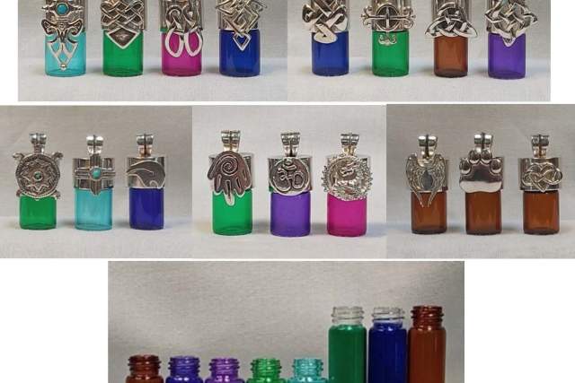 A collection of functional pendant bottles, each topped with intricate metal designs, displayed in rows with varying colors.