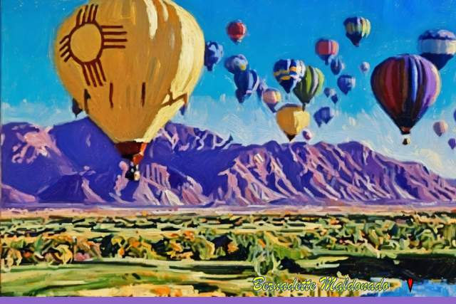 This image showcases a vibrant scene of hot air balloons of various colors and patterns rising into the sky over a scenic landscape. In the background, there are mountains, and in the foreground, plains.