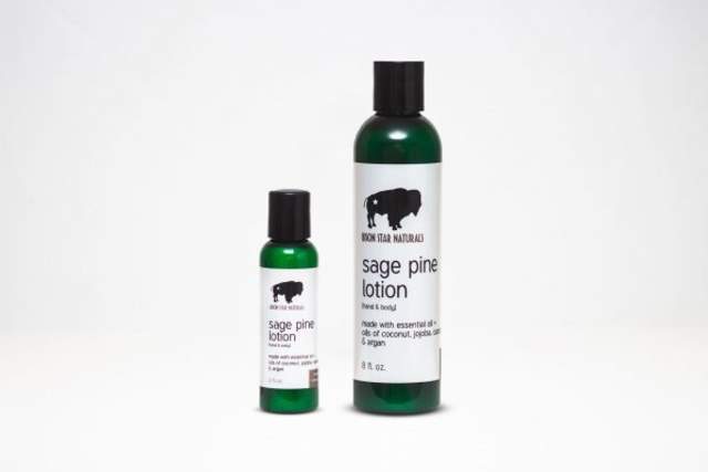 Two bottles of lotion are displayed against a plain background. Labels read "sage pine lotion"
