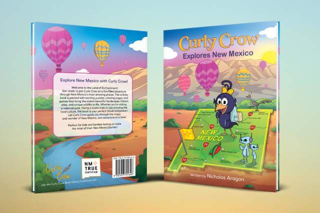 Illustrated book cover titled "Curly Crow Explores New Mexico," featuring a cartoon crow and an alien on a stylized map of New Mexico with colorful hot air balloons in the background. Written by Nicholas Aragon.