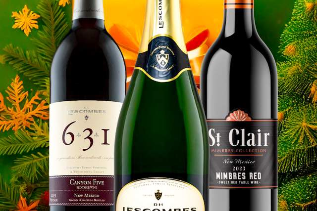 Three bottles of wine and champagne, including Lescombes Bellissimo sparkling wine, Canyon Five 631 red wine, and St Clair Mimbres Red, displayed against a festive background with pine branches and stars.