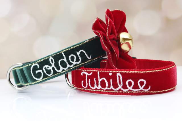 Two decorative collars with embroidered text; one green reading "Golden" and one red reading "Jubilee", adorned with a bow and a bell, on a softly blurred background.