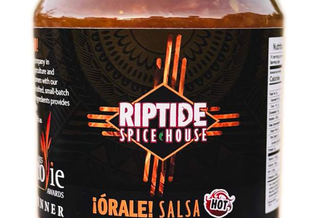 A jar of Riptide Spice House Órale! Salsa labeled as hot. The net weight is 16 oz (454 g). The label features a pattern with a stylized design.