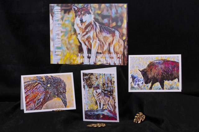 abstract and colorful portraits of animals including a wolf, a bison, a crow