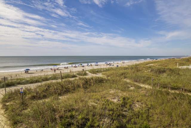 A picture of the beach and dunes in the Crescent Beach neighborhood of North Myrtle Beach