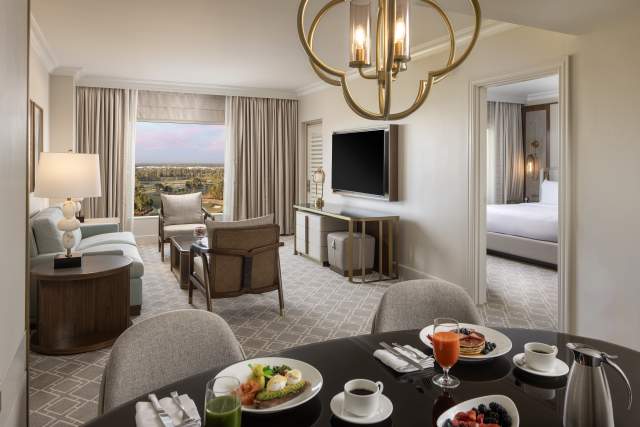 Deluxe suite living room at Waldorf Astoria® Orlando
