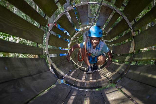 Central Florida Zoo & Botanical Gardens aerial adventure child in tunnel