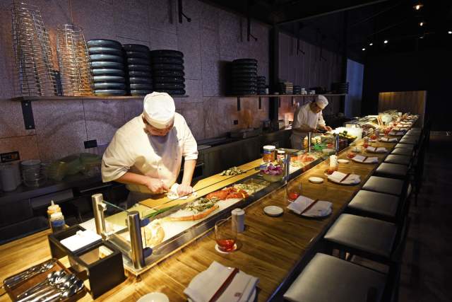 chef preparing sushi at Morimoto Asia