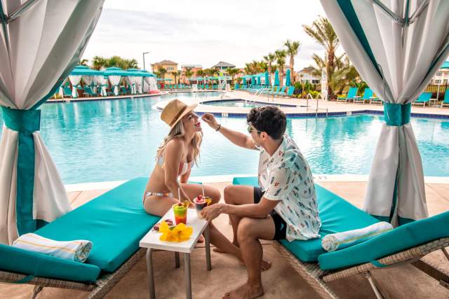 Couple in cabana at Margaritaville Resort Orlando