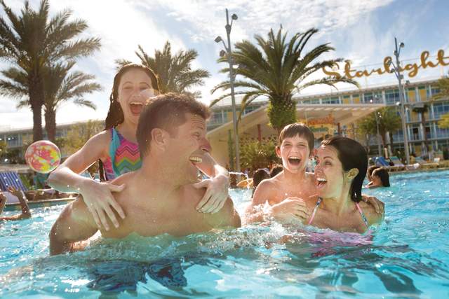 A family having fun in the pool at Cabana Bay Beach Resort at Universal Orlando Resort