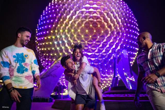 Friends at Epcot in front of Spaceship Earth