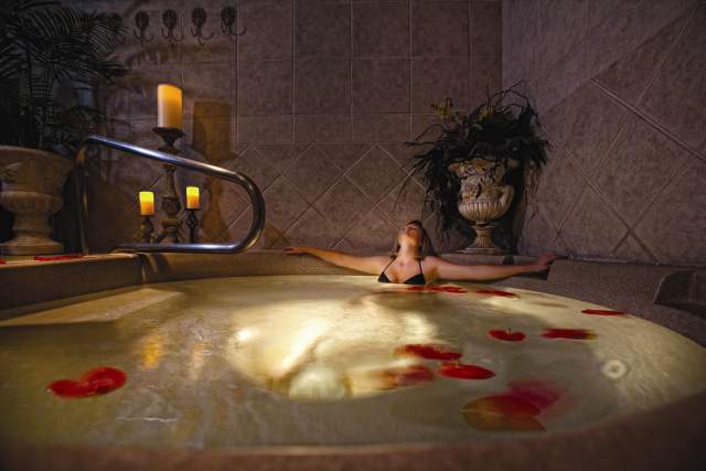 Serenity Spa by Westgate at Westgate Lakes Resort & Spa woman in hot tub