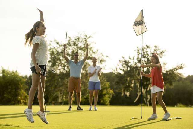 JW Marriott Orlando, Grande Lakes family playing golf