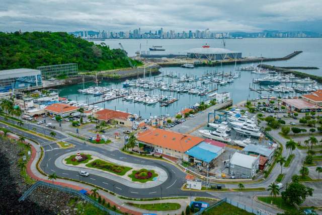 Aerial View of Amador Marina. Restaurants around it. City Skyline in the background.