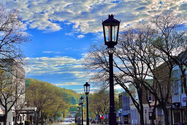 Main street with lamps on a median in the town of Wellsboro, PA