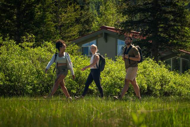 Three friends hiking in Brighton, Utah