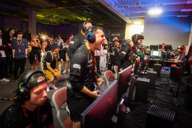 Video game athletes, playing Halo and cheering