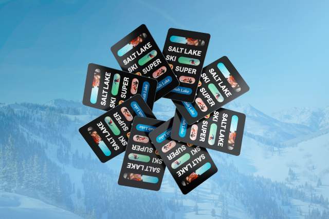 8 super pass cards in a circle on top of a faded blue background of mountains with snow